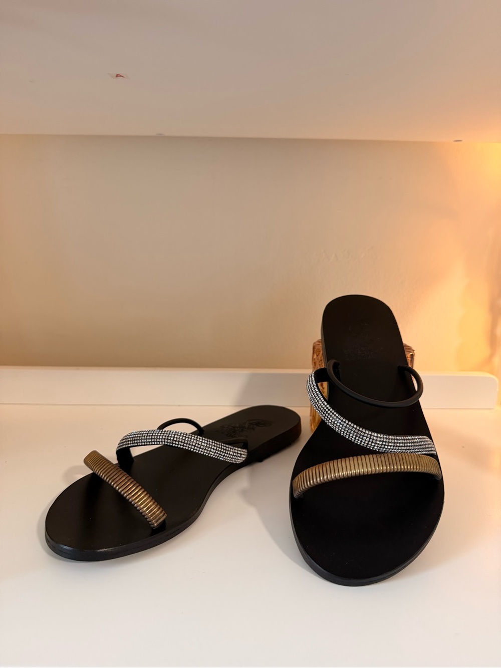 Ancient Greek Sandals Black Slip-On Sandals with Gold and Silver Accents